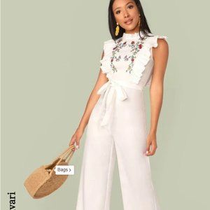 🔥🔥Never worn! White women's jumpsuit fits like a medium or small large